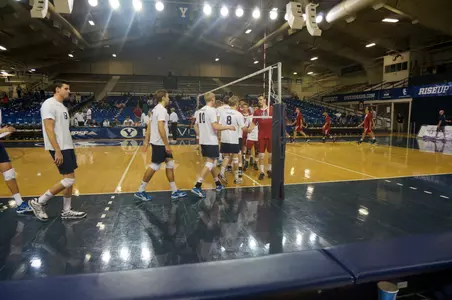 Teams shake hands prior to match