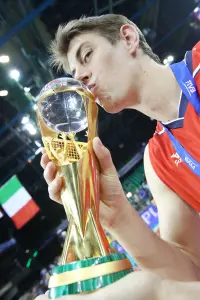 Sean Rooney and the 2014 FIVB World League trophy.
