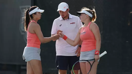 Shiori Fukuda and Taisiya Pachkaleva of Pepperdine University in action against the University of Texas at Austin during the womenÕs doubles finals at the 2021 NCAA D1 Tennis Championships on Saturday, May 22, 2021 at the USTA National Campus in Orlando, Florida. (Manuela Davies/USTA)