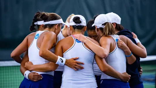 Women's tennis huddle