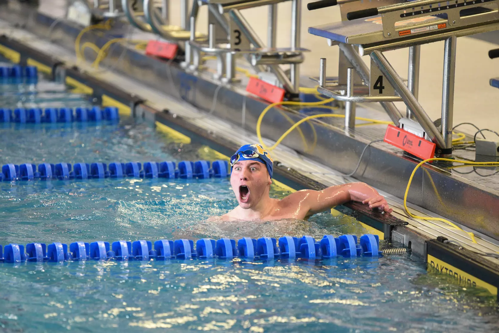 Warren Briggs breaks the school record in the 1,000 Free