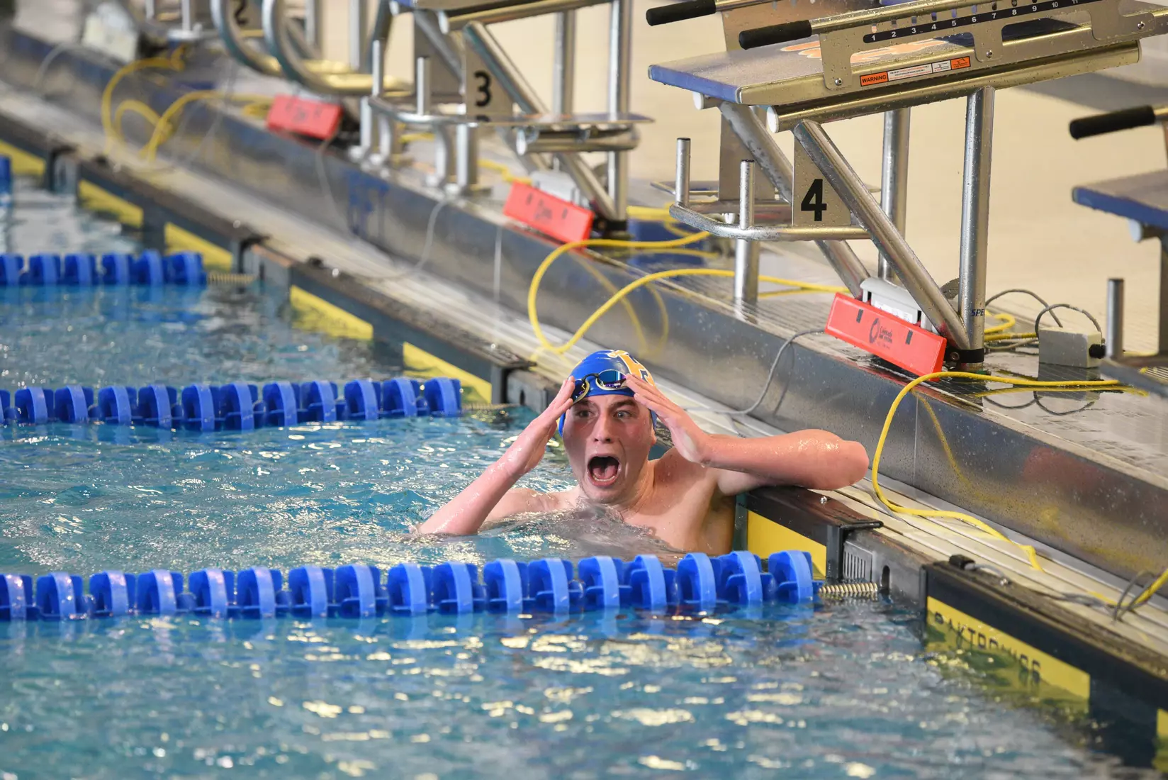Warren Briggs breaks the school record in the 1,000 Free