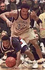 Pittsburgh's Chris Seabrooks and Connecticut's Khalid El-Amin hustle for a loose ball in the first half of Saturday's game.