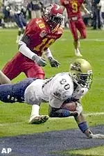 Wide receiver Antonio Bryant hauls in a touchdown pass during the third quarter Thursday.