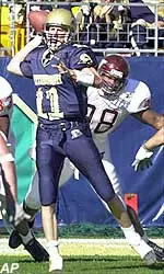 Quarterback David Priestley prepares to throw a pass as Virginia Tech defensive tackle Derrius Monroe pressures him in the first quarter. Priestley threw three touchdown passes in the Panthers 38-7 upset of 12th ranked Virginia Tech.