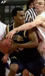 Brandin Knight, left, and Rutgers' Todd Billet fight for the ball in the second half of Rutgers 84-64 win Sunday.
