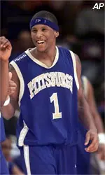 Pittsburgh's Brandin Knight congratulates teammate Julius Page after Page scored during the final minutes of their first round 78-69 victory over Miami in the Big East tournament Wednesday, March 7, 2001, in New York.