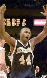 Isaac Hawkins celebrates after making the game winning free throw.
