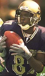 Wide receiver Roosevelt Byne catches a 56-yard touchdown pass from quarterback David Priestley.