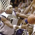 Pittsburgh's Julius Page, left, grabs a rebound in front of Notre Dame's Torrian Jones in the first half, Saturday.