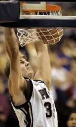 aron Gray dunks during the first half against Coppin State.