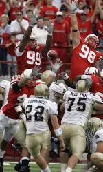 Nebraska's Adam Ickes blocks a field goal attempt by Pittsburgh's Josh Cummings as time ran out with Nebraska leading 7-6. (AP Photo/Nati Harnik)