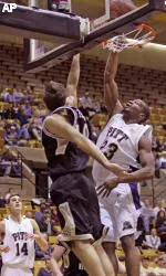 Pittsburgh's Sam Young (23) goes to the basket over Western Michigan's Donald Cloutier (40) at their basketball game in West Point, N.Y, on Sunday, Nov. 12, 2006. (AP Photo/ Jim McKnight )