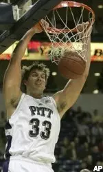Aaron Gray dunks during the first half.