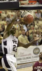 Pittsburgh's Antonio Graves dunks in front of Florida State's Jerel Allen in the first half. (AP photo)