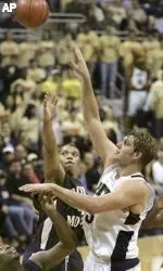 Pittsburgh's Aaron Gray, right, scores over Robert Morris' Tony Lee in the second half. (AP Photo/Keith Srakocic)