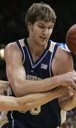 Wisconsin's Jason Chappell, left, knocks the ball loose from Pittsburgh's Aaron Gray during the first half of a basketball game Saturday, Dec. 16 2006, in Madison, Wis. (AP Photo/Andy Manis)
