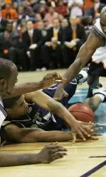 Mike Cook fights for a loose ball during Pittsburgh's game against Oklahoma State. (AP Photo/Sue Ogrocki)