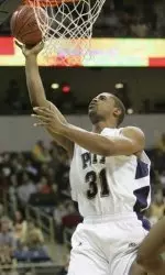 Pittsburgh's Mike Cook scores behind Floroda A&M's Rome Sanders in the first half. (AP Photo)