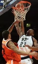 Sam Young attempts to score against Syracuse's Terrence Roberts during the first half. (AP Photo/Frank Franklin II)
