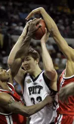 Pittsburgh center Aaron Gray (33) is surrounded by Bradley forward Marcellus Sommerville, left, and center Patrick O'Bryant in the first half of their NCAA men's second round college basketball game, Sunday, March 19, 2006 in Auburn Hills, Mich. (AP Photo/David Duprey)