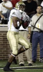 Derek Kinder catches a 55-yard touchdown pass against Cincinnati during the third quarter. (AP Photo/Al Behrman)