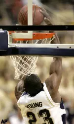 Sam Young dunks in the first half.