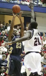 Sam Young takes a shot from the corner in the second half. (AP)