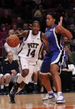 Jania Sims drives past Duke's Joy Cheek in the second half. (AP Photo/Tina Fineberg)