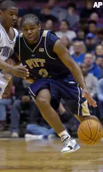 Levance Fields pushes the ball upcourt as he is guarded by Seton Hall's Eugene Harvey during second half.