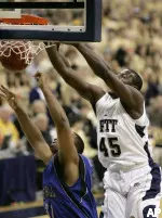 DeJuan Blair dunks a rebound over Seton Hall's John Garcia in the first half. (AP Photo/Keith Srakocic)