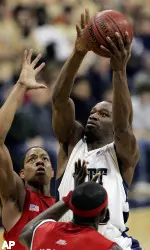 Sam Young shoots in front of Rutgers JR Inman in the first half Saturday in Pittsburgh. (AP Photo/Keith Srakocic)