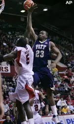Sam Young skies to the hoop vs. Rutgers. (AP Photo/Mel Evans)