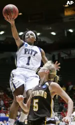 Shavonte Zellous goes up for a lay-up over Wyoming's Hanna Zavecz in the second half. (AP Photo/Jake Schoellkopf)