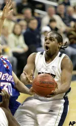 Levance Fields goes up for a shot against DePaul's Will Walker in the first half.