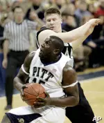 DeJuan Blair goes up for a basket in front of Notre Dame's Luke Harangody in the first half. (AP Photo/Keith Srakocic)