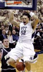 Gary McGhee dunks in the first half.
