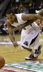 Pittsburgh's Chase Adams, left, and Texas' Justin Mason, right, chase a loose ball. (AP)