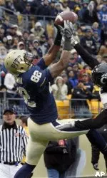 Wide receiver Jonathan Baldwin, left, reaches for a pass in the end zone.(AP Photo/Keith Srakocic)