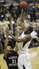 Sam Young puts up a hook shot vs. Robert Morris. (AP Photo/Keith Srakocic)
