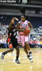 Xenia Stewart drives past a defender