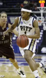 Mandy Morales defends as Shavonte Zellous drives in the first half.