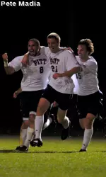 Pitt players celebrate the game-winning goal against Rutgers.