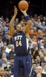 Pittsburgh's Jermaine Dixon shoots against Syracuse during the first half. (AP Photo/Kevin Rivoli)