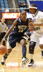 West Virginia's Sarah Miles, right, guards Pittsburgh's Jania Sims (14) in the first half of an NCAA college basketball game in Morgantown, W.Va., on Tuesday, Jan. 5, 2010. (AP Photo/David Smith)