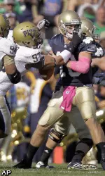 Pittsburgh defensive tackle Jabaal Sheard sacks Notre Dame quarterback Dayne Crist.