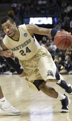 Jermaine Dixon drives to the hoop (AP Photo/Morry Gash)