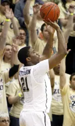 Lamar Patterson tries a three-point shot against West Virginia on Thursday night.
