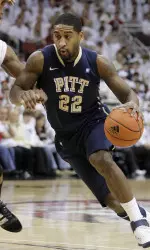 Brad Wanamaker drives past a Louisville player on Sunday afternoon.