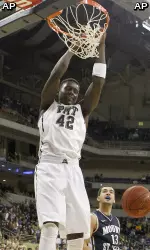 Talib Zanna dunks in front of Mount St. Mary's Kristijan Krajina during the first half.